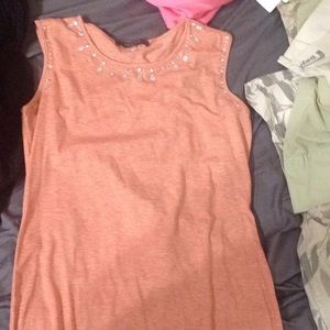 Orange tank top with diamonds on the top